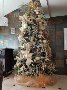 a decorated christmas tree in a living room