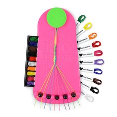 an assortment of crafting supplies including crochet hooks, needles and colored markers