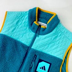 Adidas Golf Adx Padded Artic Fusion Vest Size: M Color: Arctic Fusion (Green/Yellow) Closure: Full Zip Code: Ib1967 Green Fleece Jacket With Fleece Lining For Sports, Adidas Fleece Outerwear For Sports, Sporty Fleece Outerwear With Patchwork, Sporty Patchwork Fleece Outerwear, Adidas Fleece Outerwear Sportswear, Adidas Fleece Sportswear Outerwear, Adidas Yellow Outerwear For Streetwear, Yellow Athleisure Winter Outerwear, Yellow Athleisure Outerwear For Winter