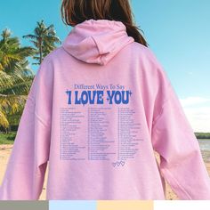 "Ways to say I love you, Cute sweatshirt, Trendy crewneck, Best friend gift, Sorority sisters big little reveal shirts Trendy hoodies: https://etsy.me/3BcsHPQ 🌻 Please read all of the description:  This hoodie/sweatshirt is NOT oversized, you need to buy 2-3 sizes larger 🔔 Example: if you use size S choose between a size L or XL. This hoodie/sweatshirt is perfect for anyone who wants to share their positivity with everyone around them! 💡 HOW TO PLACE YOUR ORDER: 1. Please Check and Review all Y2k Pink Hoodie With Letter Print, Kpop Hooded Sweatshirt With Letter Print, Kpop Style Letter Print Sweatshirt For Streetwear, Kpop Letter Print Sweatshirt For Streetwear, Kpop Style Long Sleeve Sweatshirt With Letter Print, Kpop Long Sleeve Sweatshirt With Letter Print, Sweatshirts Preppy, Big Little Reveal Shirts, Preppy Hoodie