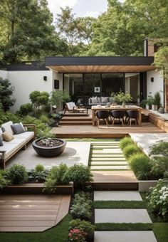 an outdoor living area with seating and landscaping