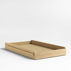 an empty wooden tray on a white background