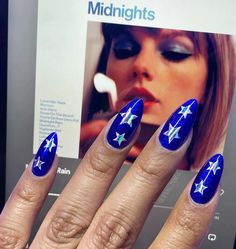 Whether you’re headed to the Eras Tour or simply in the heart of your Taylor Era, we’ve got lots of Taylor Swift nail ideas for you to look through and fall in love with—like these sparkly royal blue nails with a metallic silver star design inspired by the Midnights album on the Eras tour! Debut Nails Taylor Swift, Taylor Swift Midnight Nails, Midnights Nails Taylor, Taylor Swift Nails Inspired, Reputation Nails, Slay Nails, Italy Nails, Taylor Nails