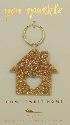 a house shaped keychain with the words, you sparkle home sweet home