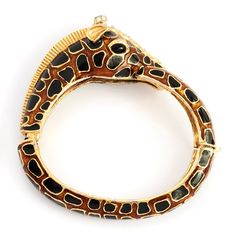 Vintage Rare Ciner Giraffe Bangle Bracelet, Bronze With Black Enamel, Bangle, With Jet Black Cabochon Accented Eyes, And Swarovski Crystals. Push Lock Closure, 20k Gold Plated. Dates Back To The 80's. Visit Us At Parallelluxury.Com To See More Photos And Additional Items. Designer: Ciner Fit: Will Fit A 6-7 Inch Wrist Color: Gold, Brown, Black Material: Gold Plated, Crystal Circa: 80s Condition: Very Good Good Condition: There Are 10 Crystals Are Missing As Pictured, 2 From Nose, 5 Between The Eyes And 3 On The Ears, A Jeweler Could Replace These, Not Noticeable When Wearing. "Ciner Began Making Costume Jewelry In The 1930s, In Sterling Silver, Long Before Other Back To The 80's, Enamel Bangle, Good Good, The 80's, Matching Necklaces, Black Enamel, Jet Black, Luxury Items, Bangle Bracelet