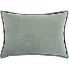 the grey velvet pillow is shown on a white background