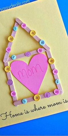 an image of a mother's day card with a heart in the shape of a house