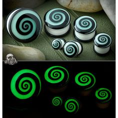 green and black swirl knobs are shown in the dark, with skulls on the floor