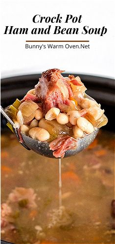 a spoon full of soup with beans and ham