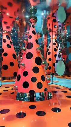 there are many polka dot trees in the room