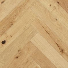 an image of wood flooring that looks like herringbones