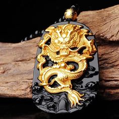 Unleash the Fury of the Dragon! Kings of the spirit world, dragons fear nothing. In Eastern culture, the Yellow Dragon 黃龍 is the fifth element of Earth and the God at the center of the Cosmos Are you ready to release the dragon? ☯ 18K Carved Gold Dragon ☯ Black Onyx Beaded Necklace ☯ Black Onyx Pendant Gold Fantasy Dragon Necklace, Gold Fantasy Necklace With Dragon Design, Black Jewelry With Dragon Design Collectible, Collectible Black Jewelry With Dragon Design, Black Spiritual Jewelry With Dragon Design, Spiritual Black Jewelry With Dragon Design, Dragon Plate, Steampunk Aesthetic, Yellow Dragon