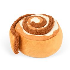 a cinnamon roll stuffed animal on a white background