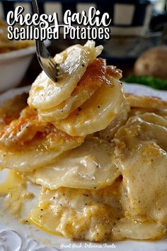 a white plate topped with pasta covered in cheese