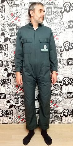 "One Piece green Coveralls vintage green Jumpsuit mens Overalls mens Coveralls utility workwear mechanic uniform M zip up mens Coveralls 65%-polyester; 35%-cotton height of the men in the photo - 187 cm Please refer to photos for details of condition. Condition: good vintage Measurements : Length: 151cm/ 59.4\" Shoulders: 42cm/16.5\" Sleeve : 58cm/22.8\" Bust: 112 cm/44.1\" Waist 106cm/41.7\" Hips: 110 cm/43.3\" Rise: 73cm/28.7\" Inseam 76 cm/29.9\" Size: M note The color on the pictures may var Green Utility Jumpsuits And Rompers For Work, Green Utility Jumpsuit For Workwear, Green Utility Style Jumpsuit For Work, Green Utility Overalls For Workwear, Green Cotton Utility Overalls, Green Workwear Jumpsuits With Pockets, Green Long Sleeve Overalls For Workwear, Green Cotton Jumpsuits And Rompers For Work, Green Cotton Jumpsuits And Rompers With Side Pockets