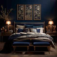 a bedroom with blue walls and artwork on the wall above the bed is lit by two lamps