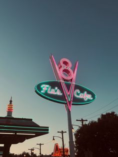 a neon sign that says 8 eleven cafe