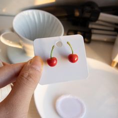 🍒 Sweet and Playful Cherry Stud Earrings 🍒 These adorable cherry stud earrings are the perfect way to add a pop of color and a touch of whimsy to your everyday look! Handcrafted with precision using high-quality polymer clay, each pair features juicy, realistic cherries complete with delicate stems. Light, vibrant, and oh-so-cute--these earrings are a must-have for fruit lovers and kawaii accessory fans alike. ✨ Features: 100% Handmade: Each pair is carefully sculpted and hand-painted, ensurin Cherry Jewelry, Miniature Fruit, Polymer Clay Miniature, Jewelry Polymer Clay, Cute Stud Earrings, Cherry Earrings, Different Fruits, Fruit Earrings, Earrings Summer