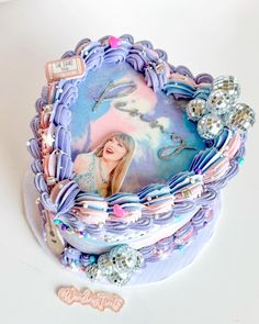 a birthday cake decorated with an image of a woman