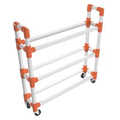 an orange and white safety rail on wheels