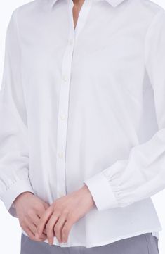 Gathers at the cuffs create light volume in the sleeves of this cotton-blend sateen button-up that's a versatile addition to your workplace wardrobe. 26" length (size Small) Front button closure Point collar Long sleeves with adjustable button cuffs 55% cotton, 45% polyester Hand wash, tumble dry Imported Daywear Shirt With Button Cuffs And Fold Down Collar, Dress Shirt With Button Cuffs For Daywear, Button-up Dress Shirt With Button Cuffs For Daywear, Business Tops With Cuffed Sleeves Button-up, Cotton Office Blouse With Cuffed Sleeves, Business Button-up Top With Cuffed Sleeves, Business Button-up Shirt With Cuffed Sleeves, Cotton Blouse With Button Cuffs For Daywear, Spring Workwear Dress Shirt With Button Closure