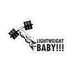 a sticker with the words light weight baby and a hand holding a barbell