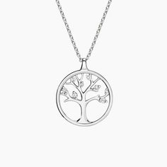 a silver tree necklace on a chain with white stones in the shape of a circle