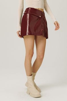 Front zip fly closure Asymmetric waistline Faux leather skirt Snap button detail 100% Polyurethane Professional Clean Only / Do Not Tumble Dry S: Waist: 35cm (13.8in) / Hip: 45cm (17.7in) / Hem: 51cm (20.1in) / Length: 37cm (14.6in) / M: Waist: 36cm (14.2in) / Hip: 46cm (18.1in) / Hem: 52cm (20.5in) / Length: 38cm (15.0in) / Model's height is 5′ 6″ (173.5cm) Bust 30in Waist 23.6in Hip 34.6in and wearing S/M 사이즈 정보Size information (단위:cm)(Unit : inch) SS 사이즈 정보 Size information 허리Waist 3513.8 엉덩이 Faux Leather Skirt, Button Detail, Snap Button, Best Sellers, Leather Skirt, Latest Trends, Mini Skirts, Faux Leather, How To Wear