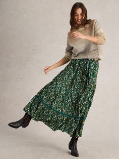 There’s something about this organic cotton maxi skirt that makes us want to sweep across the countryside like a Jane Austen heroine. Though we prefer to team ours with cowboy boots and jumpers. (Petticoats and aprons aren’t really our thing.) Cotton Maxi Skirt, Green Maxi Skirt, Cotton Maxi Skirts, Maxi Skirt Outfits, Tiered Maxi Skirt, White Stuff, Cotton Maxi, Wedding Guest Dress Summer, Black Wrap Dress