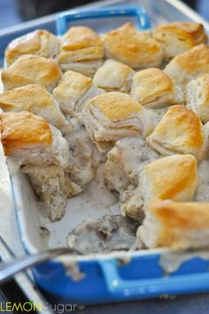 a casserole dish with chicken and cheese in it, ready to be eaten