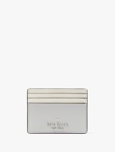 Madison Medium Compact Bifold Wallet | Kate Spade Outlet White Rectangular Kate Spade Wallet, Chic Kate Spade Bifold Wallet, Compact Kate Spade Wallet, Kate Spade Black Wallet With Interior Card Slots, Kate Spade Wallets With Zipper Closure, Kate Spade Outlet, Logo Line, Loose Change, Kate Spade Wallet