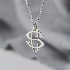 PLEASE NOTE: I am still be taking orders (both UK and International) and making jewellery from my garden studio with the utmost care and safety during these unprecedented times. A beautiful handmade solid sterling silver monogram necklace.Two initials are entwined to create your monogram, we then create the pendant from sterling silver. The initials could be the wearers initials, yours and her initials combined, or perhaps the children's initials.This beautiful, delicate necklace makes the perfe Monogrammed Cufflinks, Initial Cufflinks, Silver Monogram, Making Jewellery, Sterling Silver Initial, Garden Studio, Cufflinks Wedding, Monogram Necklace, Silver Cufflinks