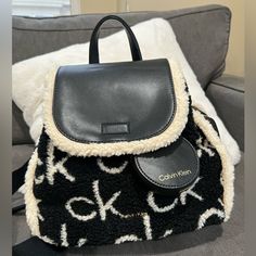 Remember:- This Bag Has Half Real Leather And Half Fur. It Also Comes With Small Coin Pouch. Brand New With Tags And Packaging. Never Used It. Size:- Large. Color:- Black And White. Small Coin Pouch, Fur Backpack, Calvin Klein Bags, Red Backpack, Calvin Klein Bag, Leather Backpack Purse, Faux Leather Backpack, Unisex Backpack, Calvin Klein White