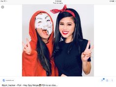 two women with masks on their faces giving the peace sign