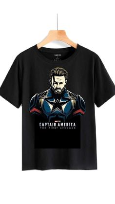 the captain america t - shirt hanging on a wooden hanger with an image of iron man