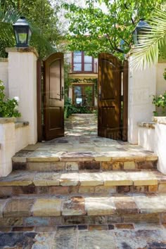 an entrance to a house with stone steps