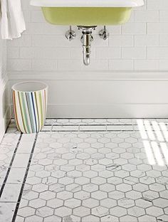 a bathroom with a sink and toilet in it