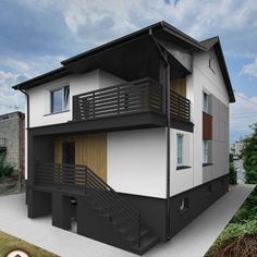 a two story house with balconies on the second floor