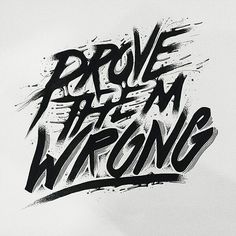 some type of lettering that is black and white with the words prove it's wrong