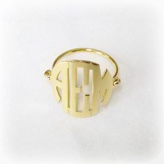 Our Cutoff Date for Christmas delivery is Sunday Dec. 13, 2020All Order placed after this date will be completed for mid January delivery.***Orders submitted by December 18, 2017  will receive FREE SHIPPING UPGRADE for a Christmas DeliveryOrders submitted by December 15 are Guaranteed for Christmas Delivery.This Personalized monogram Ring is 0.75  inch wide, made of solid 14k yellow gold. The ring can be made with the initials of your choice. Please use the note section available at checkout to Luxury Yellow Gold Monogram Initial Ring, Luxury Gold Monogram Initial Ring, Luxury Monogrammed Initial Gold Ring, Script Necklace, Monogram Ring, Wire Ring, Gold Name Necklace, Photo Pendant, Photo Necklace