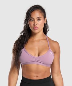 Gymshark Minimal Sports Bra - Soft Purple Sporty Sports Bra For Light Exercise With Light Support, Supportive Sports Bra In Pink, Pink Sporty Sports Bra With Adjustable Straps, Pink Sports Bra With Adjustable Straps, Sporty Pink Sports Bra With Adjustable Straps, Sports Racerback Bra With Adjustable Straps, Sporty Breathable Gym Bra, Sports Bra With Adjustable Racerback Straps, Purple Sports Bra With Built-in Bra For Light Exercise