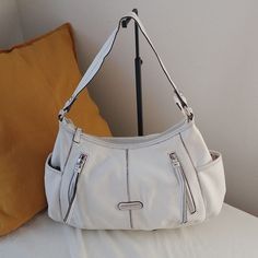 100%Leather handbagimportedinside zippered pockets with multiple open pocketsmultiple outside zippered pockets with dual side pockets White Hobo Bag With Zipper And Double Handle, White Leather Hobo Bag With Zipper Closure, White Double Handle Hobo Bag With Zipper, White Leather Bags With Pockets, White Hobo Bag With Zipper Closure For Travel, White Travel Hobo Bag With Zipper Closure, Purse White, Coach Jewelry, Etienne Aigner