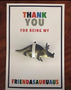 a card with an image of a dinosaur on it and the words thank you for being my