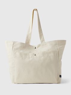 Smooth linen-cotton blend tote bag.  Shoulder straps at top.  Patch pocket at front.  Buttons at center.  Dimensions: 14. 57 L x 7. 48 W x 14. 96 H Hoodie Gap, Tote Bags For School, Closet Tour, School Tote, Best Tote Bags, Student Bag, Linen Bag, Crossbody Tote, Cotton Totes