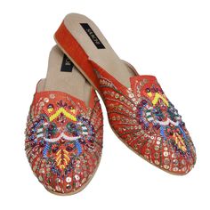 "This Orange Heeled Mule is a luxurious pair featuring an ornate design with colorful embroidery and beading. The opulent design makes these beaded mules the perfect pair to holiday events and fancy dinners! Sophisticated, timeless, and wholly feminine, these embroidered mules are simply the perfect finishing touch to any outfit. Each pair is completely handmade with fine materials and is comfortable enough to wear all day long. The Fine Details: 1\" Wedge Heel Slip-on Styling Sizes Available: U Embroidered Mules, Holiday Party Shoes, Shoes Beaded, Fancy Dinners, Heeled Mule, Clogs And Mules, Mule Shoes, Embellished Shoes, Colorful Embroidery