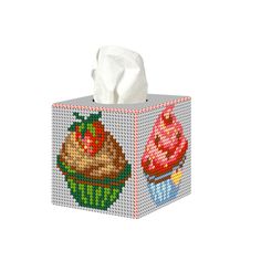 a tissue box with two cupcakes on it