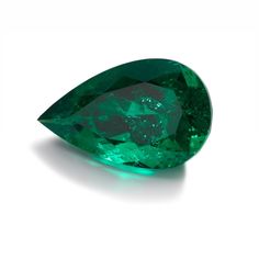 a green diamond on a white background