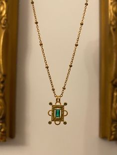 Gold-plated pendant with an emerald green rectangle jewel measuring 2.5 cm long and hung on a gold-plated stainless steel ball chain measuring 18 inches. INTERNATIONAL BUYERS please choose the tracking option if you would like your order to be tracked. FREE tracking upgrade with 3 items or more purchased. JEWELLERY CARE please don't wear plated jewellery in the shower, bath or swimming for the plating to last longer. Art Deco Emerald, Rectangle Necklace, Velvet Cushions, Ball Chain, Jewelry Plate, Shower Bath, Jewelry Care, Black Velvet, Emerald Green