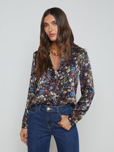 Meet the iconic long-sleeve silk button-down that belongs in every wardrobe. Reimagined each season in fresh colorways and prints, the Tyler is back in an opulent jeweled print inspired by our Culver jacket.• 100% silk charmeuse• Long sleeves• Pleated yoke• 1-button cuffs• Front button closure | L'AGENCE Tyler Silk Blouse Top In Black Perfect White Tee, Elizabeth Cole, Knit Denim, Girls Wardrobe, Silk Charmeuse, Vintage Jewels, Blouse Top, Black Blouse, Silk Blouse