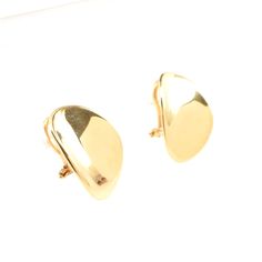 Surprise your favorite lady (or treat yourself) with these gorgeous omega earrings! These exquisite 14 karat solid yellow gold pair of earring jackets features a flower form. Wear them with your own studs. Each jacket measures 23.44 millimeters (15/16 inch) long by 17.27 millimeters (11/16 inch) deep. The pair weighs 6.19 grams and are stamped 14K and signed FC ITALY. Good estate condition. We are listing several pieces of estate jewelry, along with other items fresh from fine North Carolina est Modern Polished Clip-on Earrings For Anniversary, Classic 14k Gold Clip-on Earrings With Polished Finish, 14k Yellow Gold Polished Clip-on Earrings, Classic 14k Gold Clip-on Earrings, Classic 14k Yellow Gold Clip-on Earrings, Modern Yellow Gold Clip-on Earrings With Polished Finish, Modern Yellow Gold Clip-on Earrings For Anniversary, Modern 14k Gold Clip-on Earrings, Classic Clip-on Earrings For Anniversary, Tarnish Resistant